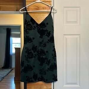 Green and black mini dress.